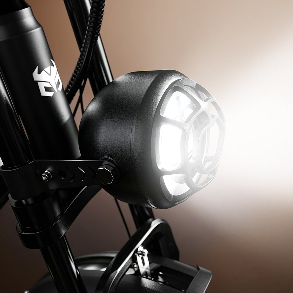 Round LED headlight switched on at the front of the bike