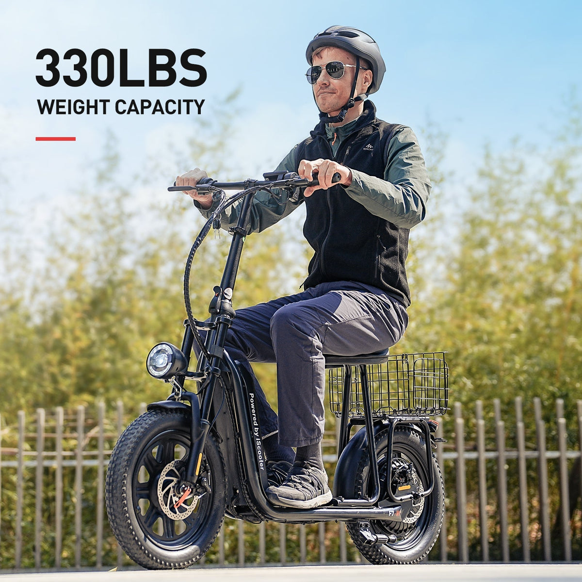 iScooter F7 1000W seated commuter electric scooter with adjustable saddle, dual disc brakes plus electric braking, front and rear dual suspension, foldable aluminum frame, and turn-signal lighting on a 28 mph paved-road commuter platform