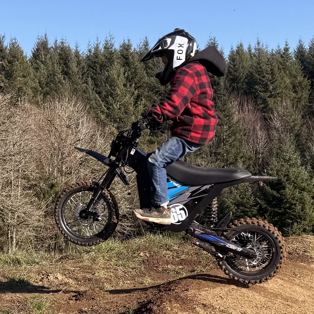 HappyRun G300 SE Mini mid-drive off-road electric dirt bike: 4500W peak mid-drive motor, 36 mph top speed, 1248Wh battery, hydraulic disc brakes with 190mm rotors, full suspension, 29-inch seat, 3'11" to 6'1" rider range, IPX5, carbon steel frame