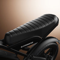 Ribbed bench saddle above the rear suspension on the CycHunter 2.0