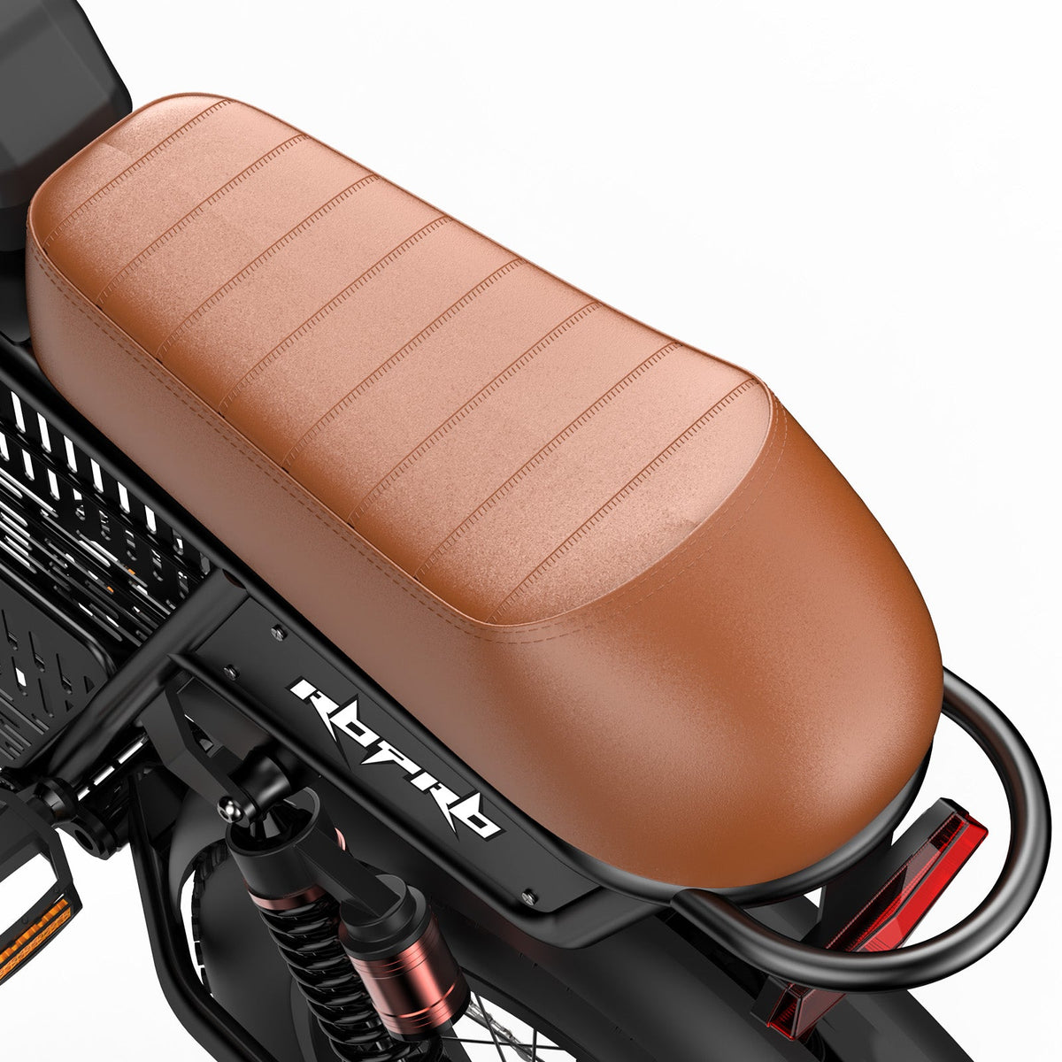 isinwheel R6 Pro upright profile view with the long brown bench saddle, integrated center cargo basket, and tan and black retro graphics on the tank shell
