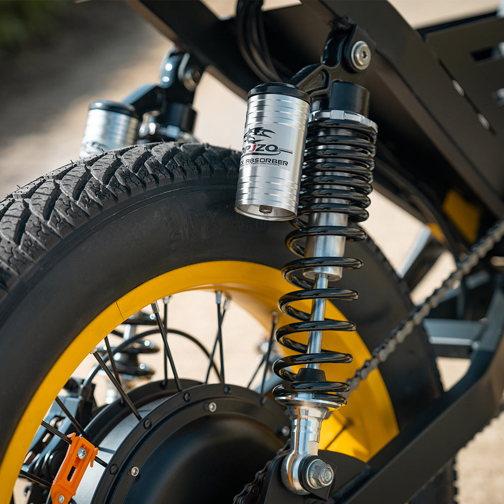 Detail view of the HappyRun G100 Pro frame mid-section showing the carbon steel frame, dual battery enclosures, and the auto-switching balancer module