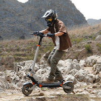 Circooter Landturbo off-road folding electric scooter with single-motor build (1000W or 1500W peak), 10-inch pneumatic all-terrain tires, dual swing-arm suspension, dual disc brakes with EABS electronic anti-lock, 6061 aluminum folding frame, color LCD display, IPX5 water resistance, and UL 2272 testing