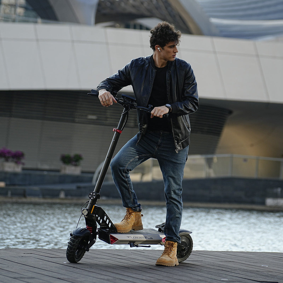 Circooter Landturbo off-road folding electric scooter with single-motor build (1000W or 1500W peak), 10-inch pneumatic all-terrain tires, dual swing-arm suspension, dual disc brakes with EABS electronic anti-lock, 6061 aluminum folding frame, color LCD display, IPX5 water resistance, and UL 2272 testing