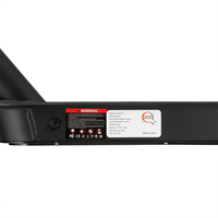 Safety and specification label on the iScooter i9 deck near the charging port and folding hardware.