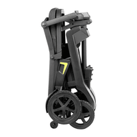 ScootNGo Lite folded upright for storage with seat and wheels tucked together