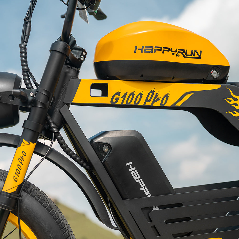 Detail view of the HappyRun G100 Pro chain, sprocket, and rear hydraulic disc brake with the 203mm rotor