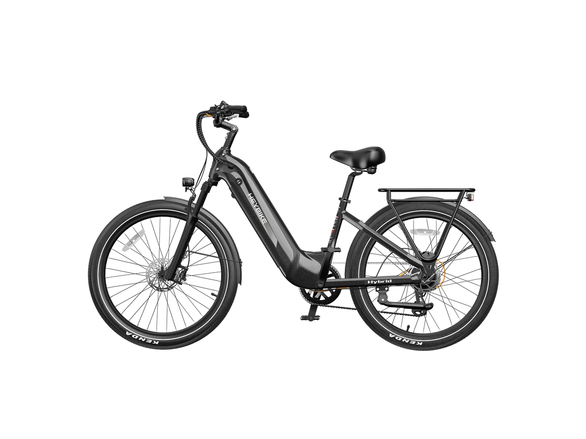 Heybike Hybrid Class 2/3 electric commuter bike with 750W rated rear-hub motor, 27.5 by 2.4 inch KENDA tires, Tektro hydraulic disc brakes, Shimano Altus 8-speed gearing, 6061 aluminum frame, hydraulic front fork, integrated turn-signal lighting, and an 864Wh battery on a UL 2849 certified electrical system
