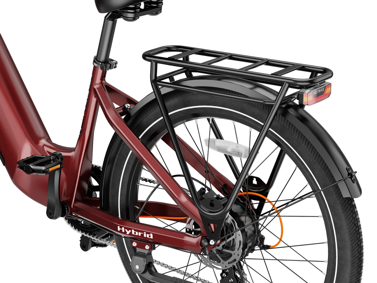 Heybike Hybrid Class 2/3 electric commuter bike with 750W rated rear-hub motor, 27.5 by 2.4 inch KENDA tires, Tektro hydraulic disc brakes, Shimano Altus 8-speed gearing, 6061 aluminum frame, hydraulic front fork, integrated turn-signal lighting, and an 864Wh battery on a UL 2849 certified electrical system