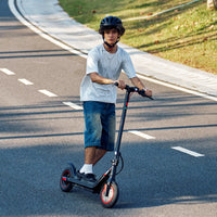iScooter i9M sub-budget folding commuter electric scooter: 42V peak 500W brushless front-wheel-drive motor, 22 mph, 315Wh battery, 10-inch pneumatic tires, EBAS plus rear disc brake, IP54, Tuya app integration, included mudguards, 28.9 lb folded