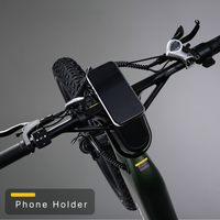 Phone holder mounted between the Nomad Pro handlebars for navigation and ride tracking.