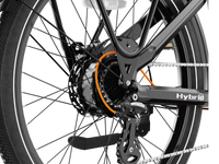 Heybike Hybrid Class 2/3 electric commuter bike with 750W rated rear-hub motor, 27.5 by 2.4 inch KENDA tires, Tektro hydraulic disc brakes, Shimano Altus 8-speed gearing, 6061 aluminum frame, hydraulic front fork, integrated turn-signal lighting, and an 864Wh battery on a UL 2849 certified electrical system
