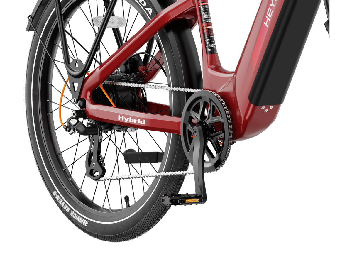 Heybike Hybrid Class 2/3 electric commuter bike with 750W rated rear-hub motor, 27.5 by 2.4 inch KENDA tires, Tektro hydraulic disc brakes, Shimano Altus 8-speed gearing, 6061 aluminum frame, hydraulic front fork, integrated turn-signal lighting, and an 864Wh battery on a UL 2849 certified electrical system
