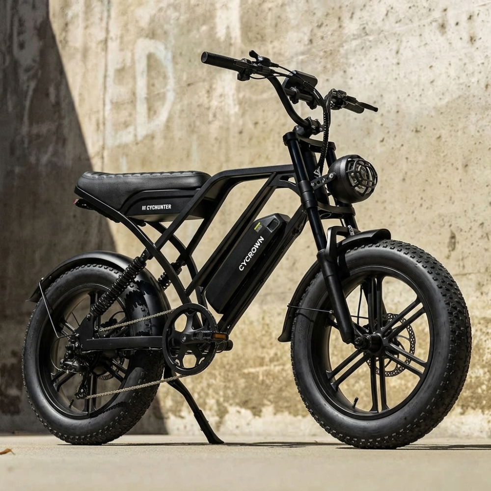 Black CycHunter 2.0 parked beside a weathered concrete wall