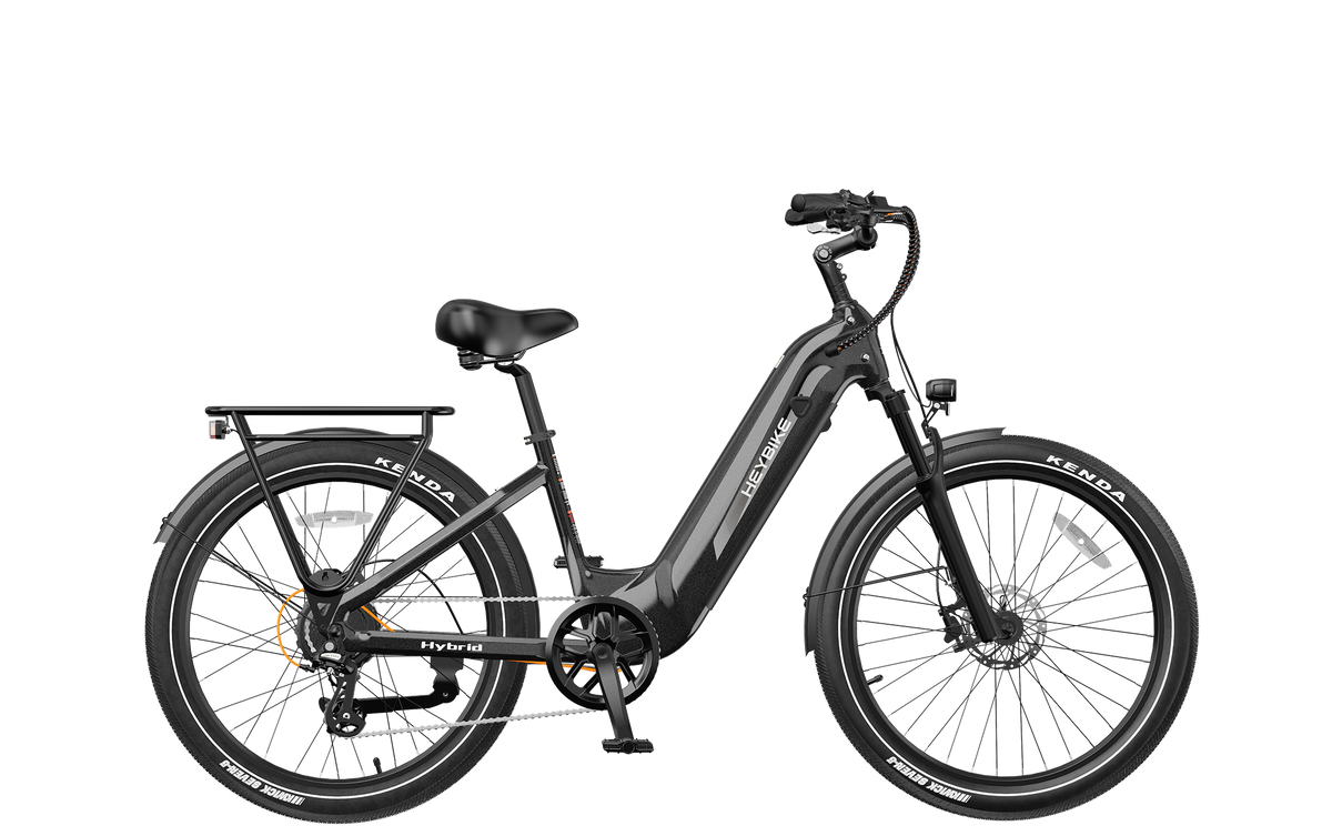 Heybike Hybrid Class 2/3 electric commuter bike with 750W rated rear-hub motor, 27.5 by 2.4 inch KENDA tires, Tektro hydraulic disc brakes, Shimano Altus 8-speed gearing, 6061 aluminum frame, hydraulic front fork, integrated turn-signal lighting, and an 864Wh battery on a UL 2849 certified electrical system