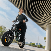 Rider traveling beneath an elevated city structure on the Run Mini