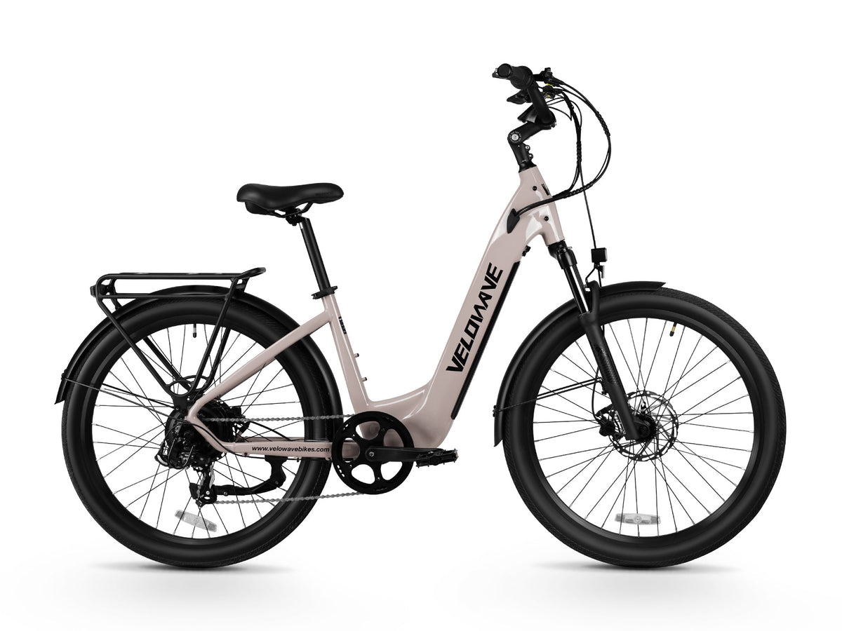 Beige Velowave Breeze T left-side profile with step-through frame, fenders and rear rack