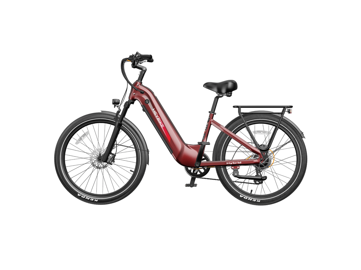 Heybike Hybrid Class 2/3 electric commuter bike with 750W rated rear-hub motor, 27.5 by 2.4 inch KENDA tires, Tektro hydraulic disc brakes, Shimano Altus 8-speed gearing, 6061 aluminum frame, hydraulic front fork, integrated turn-signal lighting, and an 864Wh battery on a UL 2849 certified electrical system