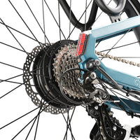 Rear hub motor, cassette, derailleur, and commuter drivetrain detail on the Cycrown Dremax.