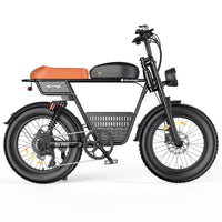 Front view of the isinwheel R6 Pro with the round LED headlight, dual-crown fork stanchions, fat knobby front tire, and the handlebar with mirrors and brake levers
