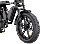 Heybike Saturn moped-style commuter e-bike: 52V 1000W continuous / 1800W peak hub motor, 95 Nm torque, single or dual-battery configuration, hydraulic disc brakes, full suspension with 140 mm front travel, turn signals, TFT color display, UL 2849 certified