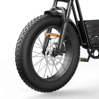 Underside three-quarter view of the R6 Pro showing the crank arm, the chain, the integrated center cargo basket, and the rear disc brake assembly