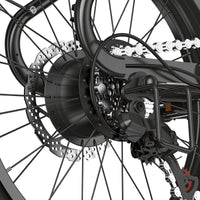 Padded brown saddle on the isinwheel U7 with the dual-coil suspension springs visible underneath