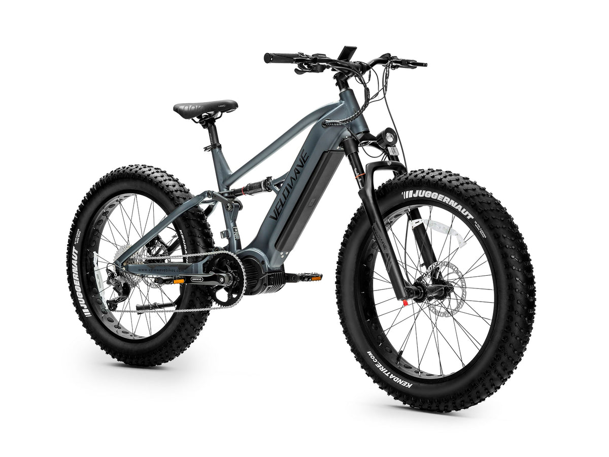 Dark Blue Brawny XM front three-quarter studio view with air fork, headlight and front disc brake