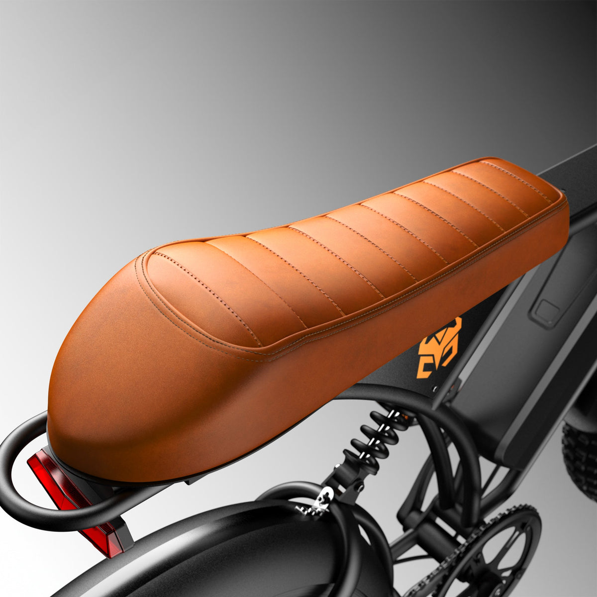 Brown bench saddle and rear suspension springs in close detail