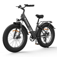 Obsidian Blue isinwheel M60 step-through fat-tire electric bike in front three-quarter studio view, showing the step-through aluminum frame, rear rack, fenders, fat tires, and disc brakes
