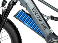 Close view of Dark Blue Brawny XM Bafang mid-drive, crank and knobby rear tire