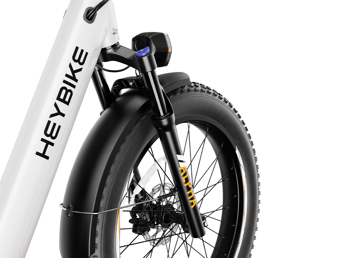 Heybike Alpha 500W mid-drive fat-tire all-terrain electric bike with a torque-plus-cadence sensor, Shimano Altus 8-speed drivetrain, hydraulic disc brakes, 26 by 4 inch fat tires, reinforced aluminum frame in step-through (Pearl White) or step-over (Galaxy Black) configuration, 680Wh battery, and UL 2849 certified electrical system