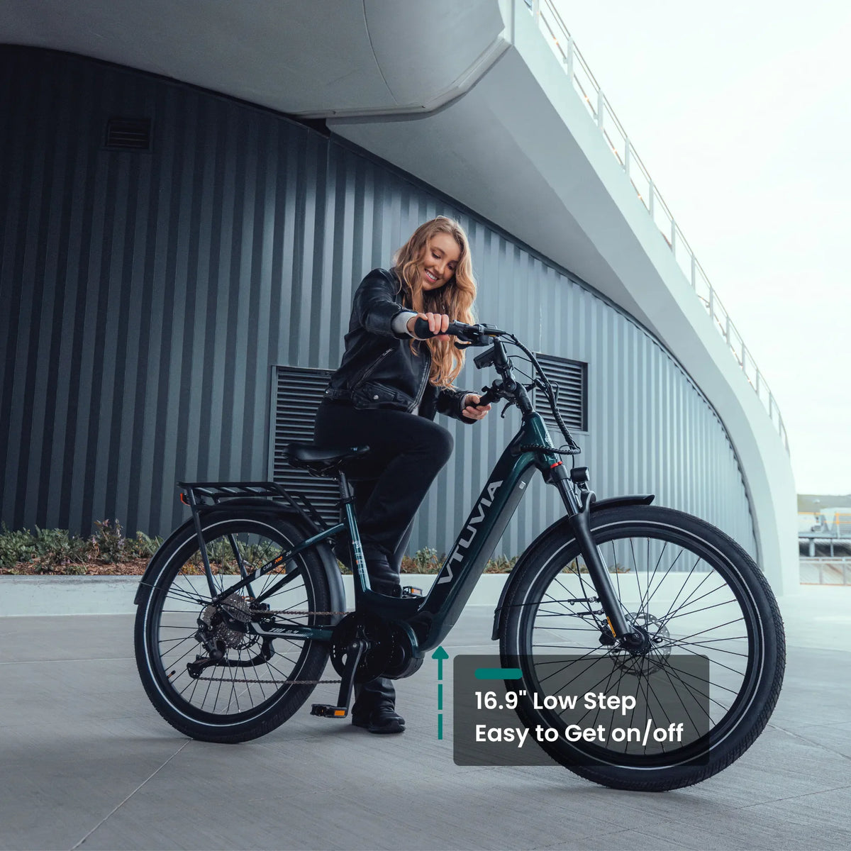 Rider stepping through the low VTUVIA CMB Pro frame
