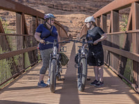 Heybike Alpha 500W mid-drive fat-tire all-terrain electric bike with a torque-plus-cadence sensor, Shimano Altus 8-speed drivetrain, hydraulic disc brakes, 26 by 4 inch fat tires, reinforced aluminum frame in step-through (Pearl White) or step-over (Galaxy Black) configuration, 680Wh battery, and UL 2849 certified electrical system