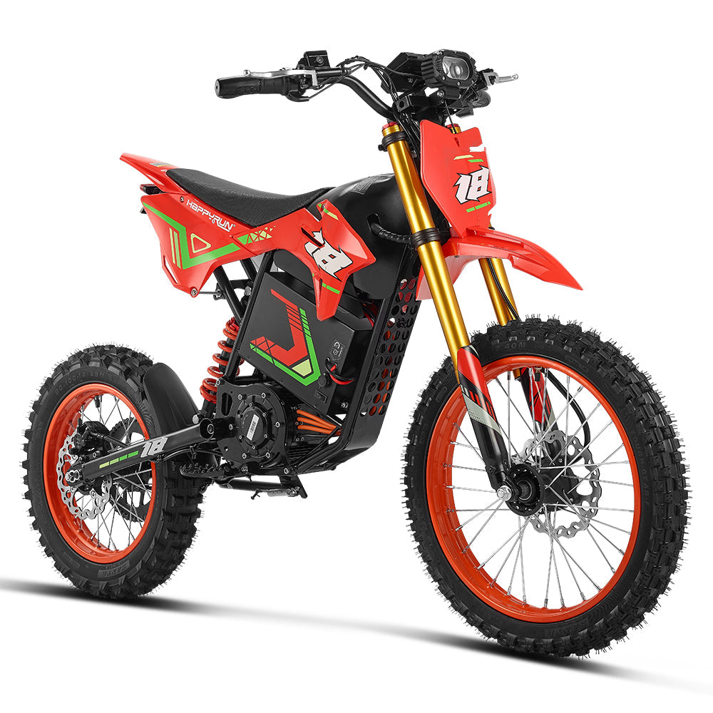 HappyRun F18 motocross-shaped electric dirt bike with a 6000W peak mid-drive motor, 245 Nm of peak torque through a chain drive, knobby off-road tires, full suspension, hydraulic disc brakes with a 190mm rotor, IPX5 water resistance, and a motocross frame in red and black with number plates