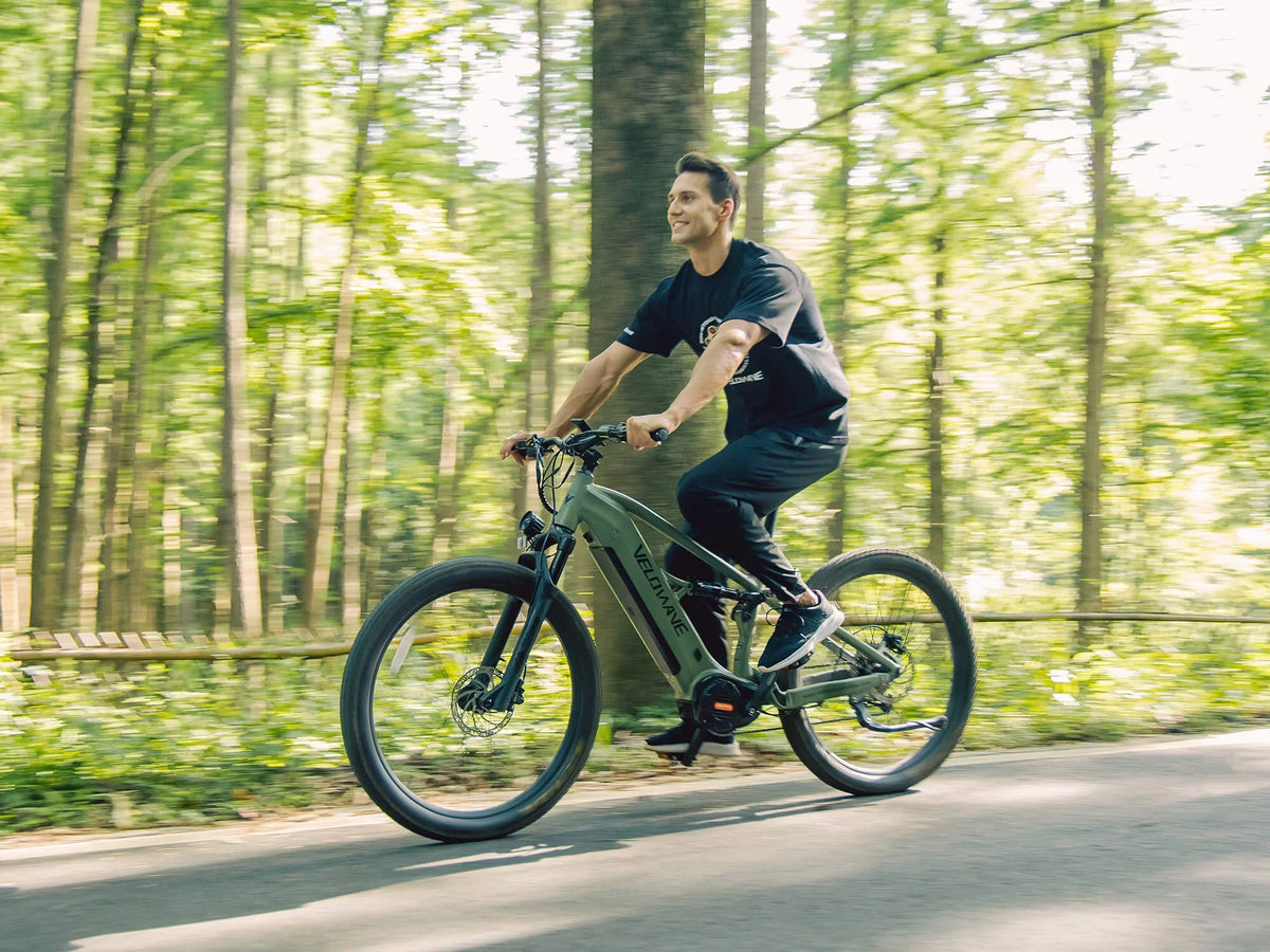 Velowave Forest XM Dark Green Forest XM on a trail