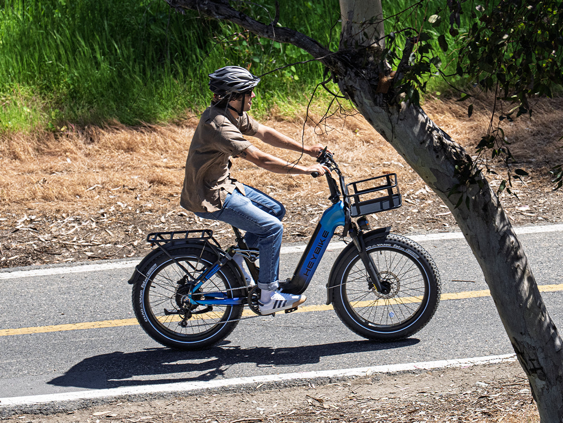 Heybike Horizon 24-inch full-suspension folding fat-tire e-bike: 750W (1400W peak) rear hub motor, 692Wh battery, 24x4 fat tires, hydraulic disc brakes, Shimano 7-speed, aluminum-alloy low-step folding frame, UL 2849 certified, four color options