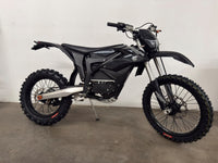 Trailblaze Motors Omega in black with 21-inch front and 18-inch rear tires