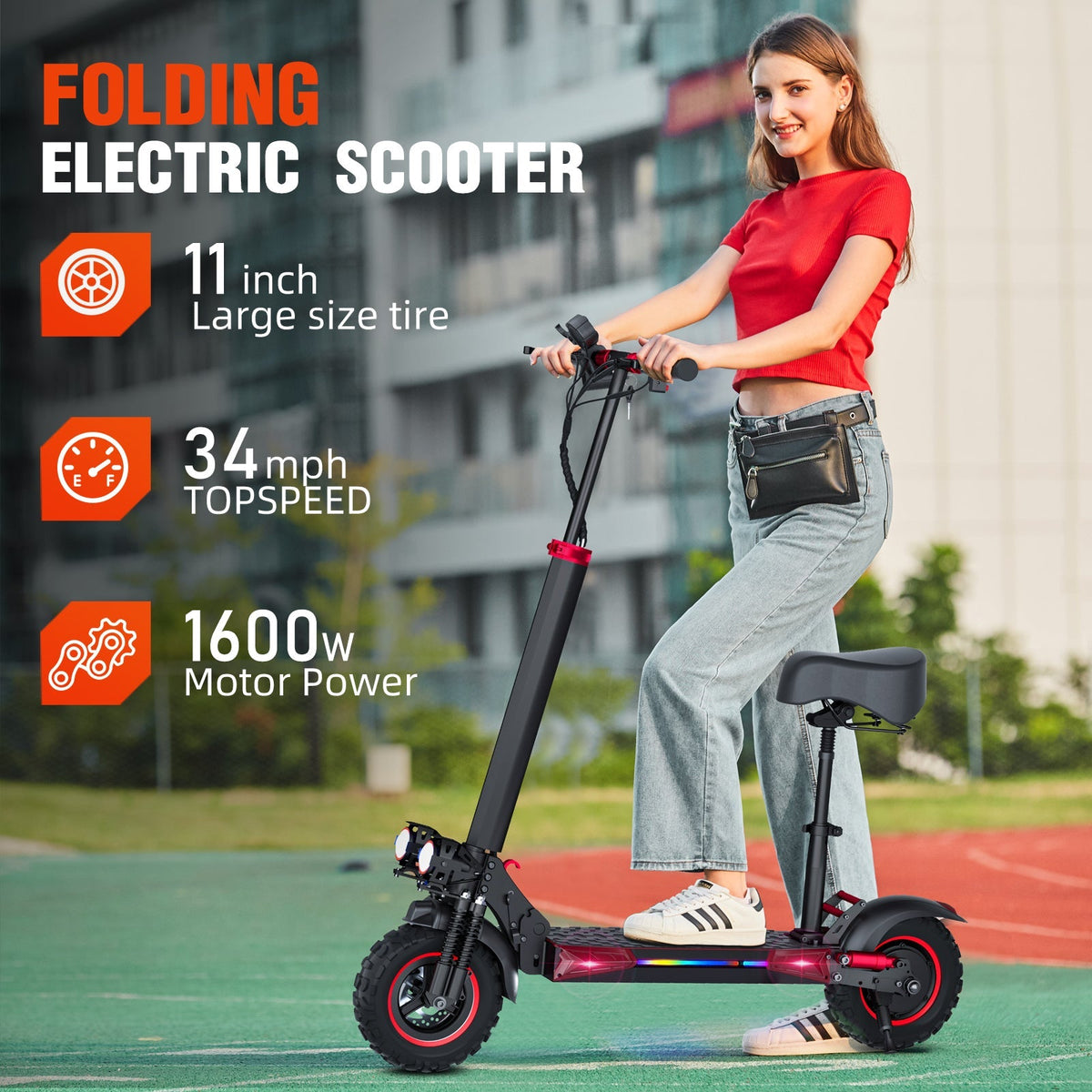 Rider standing on Freeboy J11 Plus scooter outdoors, supplier graphic showing 11-inch tires