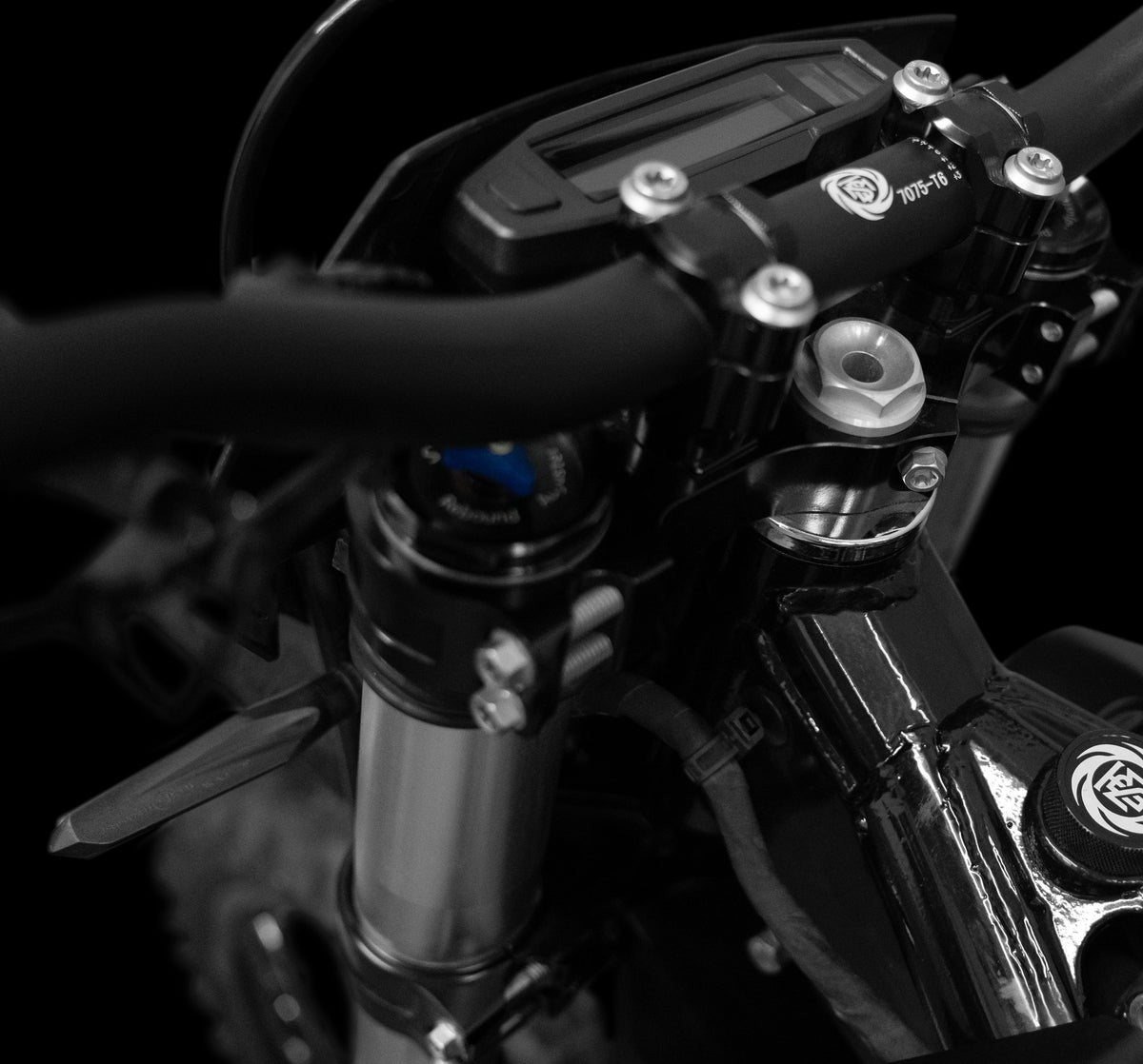 Trailblaze Motors Omega cockpit, fork crown, and handlebar detail