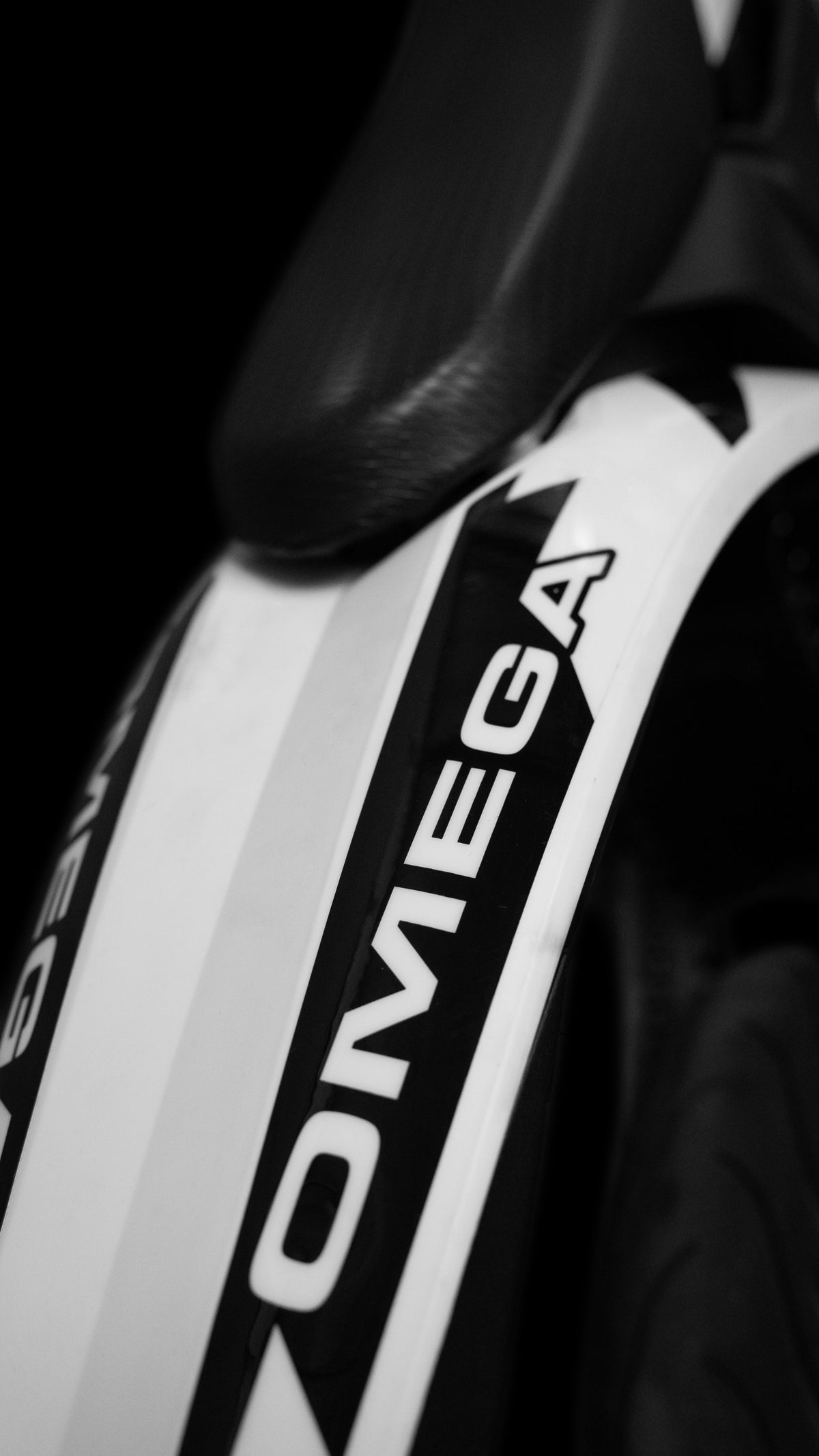 Trailblaze Motors Omega SM white side-panel graphics detail