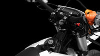 Trailblaze Motors Omega SM handlebar and fork-crown close-up