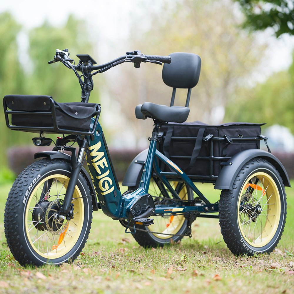 Blue MG2301 SILVERADO-HD fat-tire electric trike on grass, front three-quarter view