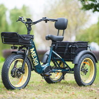 Blue MG2301 SILVERADO-HD fat-tire electric trike on grass, front three-quarter view