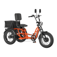Front three-quarter studio view of the Orange Meet One Tour 2.0 showing the round LED headlight, dual-shoulder front fork, hydraulic front disc brake, color LCD display, and the recumbent saddle layout with backrest