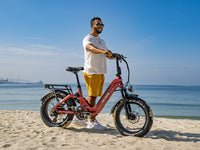 Heybike Ranger 3.0 Pro folding fat-tire electric bike with 750W rated rear-hub motor, KENDA 20 by 4 inch fat tires with puncture protection, hydraulic disc brakes, Shimano Altus 8-speed gearing, hydroformed aluminum folding frame, hydraulic front suspension, TFT color display, NFC Tap & Go unlocking, integrated turn signals, available in Ruby Red, Sapphire Blue, or Emerald Green