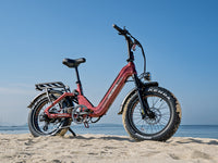 Heybike Ranger 3.0 Pro folding fat-tire electric bike with 750W rated rear-hub motor, KENDA 20 by 4 inch fat tires with puncture protection, hydraulic disc brakes, Shimano Altus 8-speed gearing, hydroformed aluminum folding frame, hydraulic front suspension, TFT color display, NFC Tap & Go unlocking, integrated turn signals, available in Ruby Red, Sapphire Blue, or Emerald Green