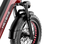 Heybike Ranger 3.0 Pro folding fat-tire electric bike with 750W rated rear-hub motor, KENDA 20 by 4 inch fat tires with puncture protection, hydraulic disc brakes, Shimano Altus 8-speed gearing, hydroformed aluminum folding frame, hydraulic front suspension, TFT color display, NFC Tap & Go unlocking, integrated turn signals, available in Ruby Red, Sapphire Blue, or Emerald Green