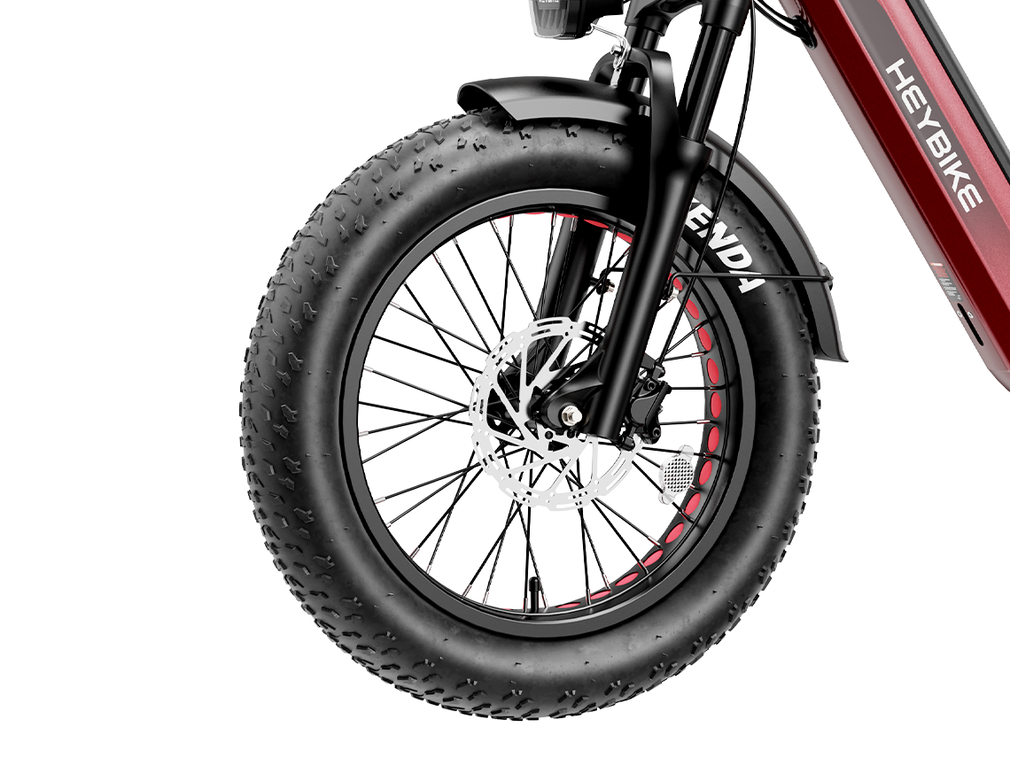 Heybike Ranger 3.0 Pro folding fat-tire electric bike with 750W rated rear-hub motor, KENDA 20 by 4 inch fat tires with puncture protection, hydraulic disc brakes, Shimano Altus 8-speed gearing, hydroformed aluminum folding frame, hydraulic front suspension, TFT color display, NFC Tap & Go unlocking, integrated turn signals, available in Ruby Red, Sapphire Blue, or Emerald Green