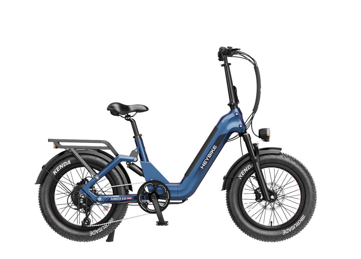 Heybike Ranger 3.0 Pro folding fat-tire electric bike with 750W rated rear-hub motor, KENDA 20 by 4 inch fat tires with puncture protection, hydraulic disc brakes, Shimano Altus 8-speed gearing, hydroformed aluminum folding frame, hydraulic front suspension, TFT color display, NFC Tap & Go unlocking, integrated turn signals, available in Ruby Red, Sapphire Blue, or Emerald Green